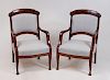 PAIR OF CONTINENTAL NEOCLASSICAL STYLE MAHOGANY ARMCHAIRS