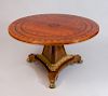 REGENCY STYLE GILT-BRONZE-INLAID SATINWOOD, ROSEWOOD AND EBONY CIRCULAR CENTER TABLE, IN THE MANNER OF THOMAS HOPE