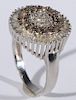 Ladies 10 karat white gold circular diamond cluster ring consisting of outer row of diamond baguettes totalling thirty-eight