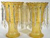 Pair of Bohemian glass lusters with prisms, amber to clear. ht. 15in., wd. 11in. Provenance: Property from the Estate of Fran