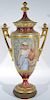 Royal Vienna covered porcelain urn having gilt finial and handles and raised gilt decoration, hand painted with woman and ves