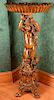 Victorian style fern stand with shell shaped bowl on cherub figure on carved stand, 20th century. ht. 51in., wd. 23in. Proven