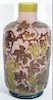 Large cameo art glass vase with purple flowers, leaves, and green grapes on purple to ivory ground, initialed M.V. Glg? ht. 1
