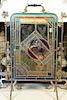Leaded and stain glass fire screen with brass frame with painted birds amongst flowers. ht. 34in., wd. 23in. Provenance: Prop