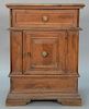 Continental walnut side cabinet having one drawer over single door set on plain molded base, probably Italian 18th century. h