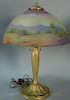 Reverse painted table lamp, scenic with sailboat on metal base. ht. 22in., dia. 16in. Provenance: Property from the Estate of