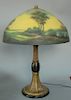 Reverse painted table lamp on metal base. ht. 22in., dia. 16in. Provenance: Property from the Estate of Frank Perrotti Jr. of