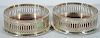 Pair of Tiffany & Co. sterling silver wine coasters with wood base. dia. 5in.