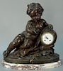 Bronze cherub shelf clock having porcelain dial all set on marble base, possibly 20th century. ht. 17 1/2in., wd. 18in. Prove