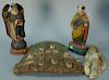 Four piece lot to include four carved figures, two are paint decorated. ht. 11 1/2in. to 13in.