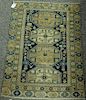 Caucasian Oriental throw rug, early 20th century (some wear). 2'8" x 3'6"