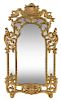 A Regence Style Giltwood Mirror Height 55 x width 32 inches.
