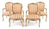A Group of Four Painted and Parcel Gilt Fauteuils en Cabriolet Height of tallest 37 1/4 inches.