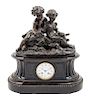 * A French Bronze and Marble Mantel Clock Width 18 1/2 inches.