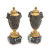 * A Pair of French Gilt and Patinated Bronze Urns Height 11 3/4 inches.
