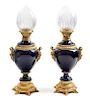 A Pair of French Gilt Bronze Mounted Porcelain Fluid Lamps Height of porcelain 15 1/2 inches.