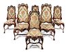 * A Set of Twelve Baroque Style Dining Chairs Height 47 3/4 inches.
