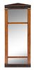 A Biedermeier Parcel Ebonized Walnut Pier Mirror Height 44 3/4 x width 18 1/4 inches.