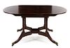 A Regency Style Mahogany Extension Dining Table Height 29 1/2 x width 62 x depth 35 3/4 inches (closed).