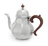 An American Silver Teapot, Retailed by Cartier, of paneled baluster form.