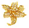 A Kenneth Lane Goldtone and Rhinestone Floral Form Brooch, Diameter 2 3/4 inches.