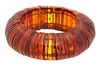 A Group of Faux Amber Diameter of bracelet 3 1/4 inches.