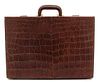 An English Vintage Brown Alligator Suitcase Height 7 x width 18 1/4 x length 12 3/4 inches.