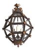 A Patinated and Pierced Metal Hanging Lantern Height 22 inches.