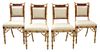 A Group of Four Regency Style Painted Faux Bamboo Side Chairs Height 34 inches.