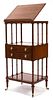 A Regency Style Mahogany Library Stand Height 43 1/2 x width 21 x depth 16 1/2 inches.