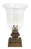 A Regency Style Cut Crystal and Bronze Hurricane Lamp Height 13 inches.