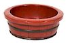 A Chinese Red Lacquered Metal Bound Bowl Height 7 1/4 x diameter 20 1/4 inches.