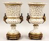 LARGE PAIR OF CONTINENTAL PORCELAIN AND ORMOLU URNS