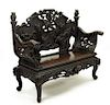Japanese Export Hardwood Bench with Richly Carved Bamboo, Iris, Water Lily and Peony Motif and Owl Finials.