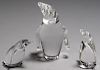 Three Steuben glass penguins, 5 3/4'' h., 3 5/8'' h., and 2 5/8'' h.