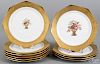 Set of ten Krautheim porcelain plates with a central basket of flowers and a gilt border