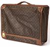Louis Vuitton monogrammed suitcase, 20 1/2'' h., 25 1/2'' w.