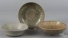 Three Korean celadon bowls, 2 3/4'' h., 7 1/2'' dia., 2 1/4'' h., 7 3/4'' dia., and 2 1/8'' h.