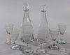 Assembled Anglo-Irish etched glass cordial set, early 19th c., to include two decanters