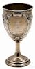 Repoussé sterling silver creamer, 4 1/2'' h., together with an unmarked goblet, 6 1/2'' h., 11.8 ozt.