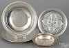 Two sterling silver plates, together with a small bowl and a brilliant cut glass plate