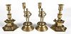 Pair of Gothic style brass figural candlesticks, early 20th c., 9'' h., together with another pair