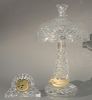 Two Waterford crystal pieces, table lamp and a small clock. Lamp ht. 19in., clock ht. 4 1/2in., lg. 7in. Provenance: Property