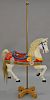 Carousel style horse with brass post, circa 1988 (one ear chipped). total height 67in., wd. 33in. Provenance: Property from t