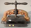Large Victorian iron book press with dolphin supports. lg. 20in.