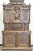Continental walnut sideboard, ht. 100in., wd. 63in., dp. 21in. Provenance: Property from the Estate of Frank Perrotti Jr. of