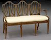 Edwardian painted three seat settee with cushion,