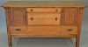 Mission oak sideboard having three drawers and two doors, Stickley style. ht. 37in., wd. 66in., dp. 23in. Provenance: Propert