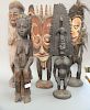 Group of five tribal African figural wood sculptures. ht. 22 1/2in. to 27 1/2in.