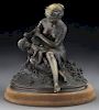 Patinated bronze depicting a woman and cherub,